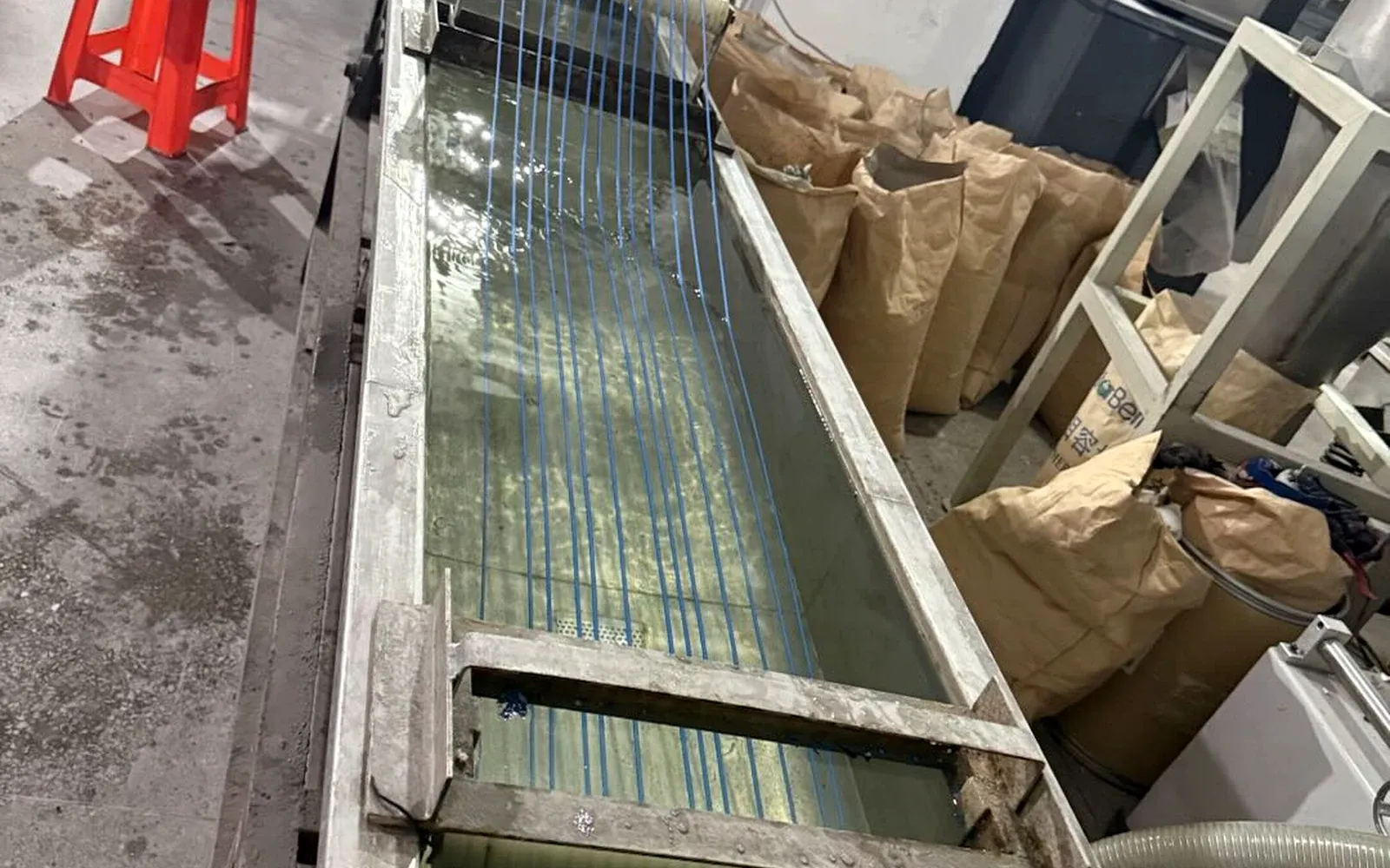 Tube extrusion and cooling line for heat shrink tubing production